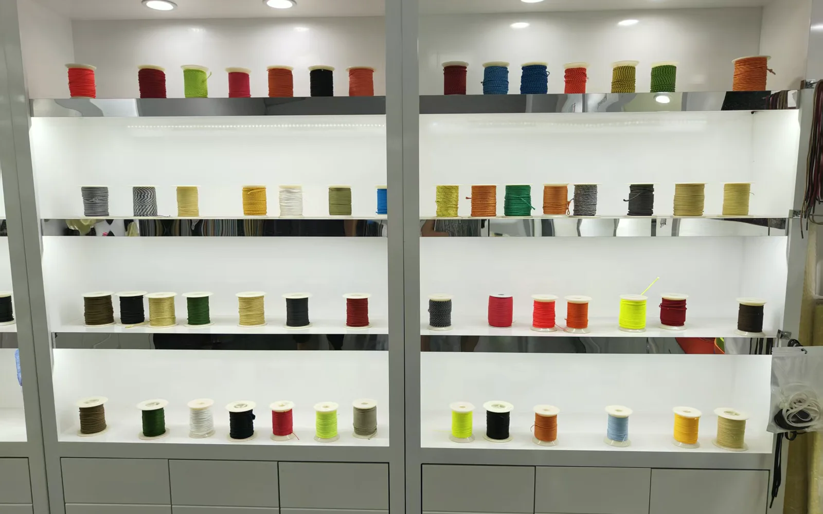 Fishing-line colour sample wall Fishing-line colour samples arranged for custom range review